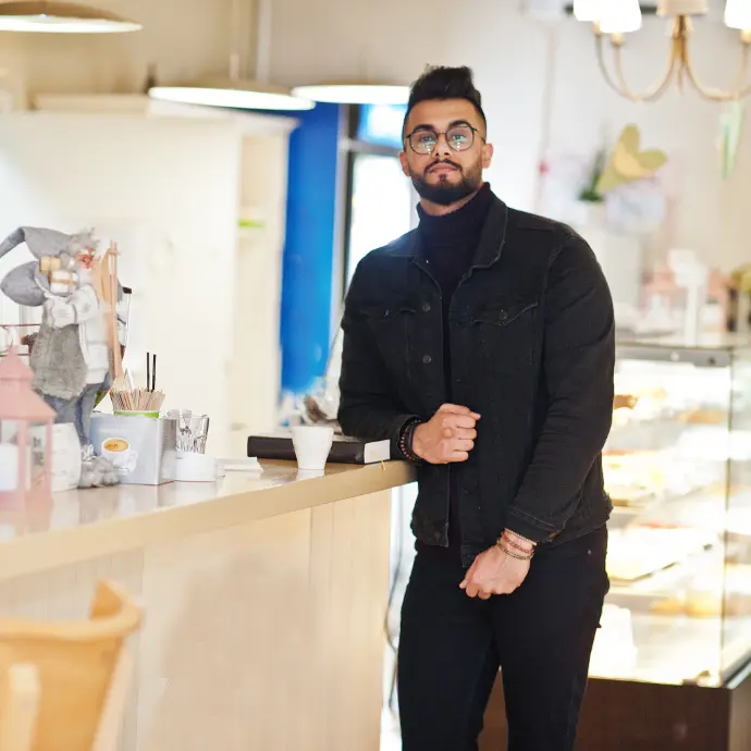 Commercial UAE License A person in his shop after obtaining his Commercial UAE License